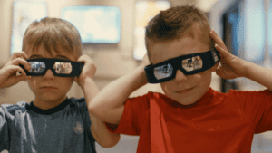 HCW kids with movie glasses