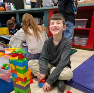 Autism Center at Misericordia - boy playing with blocks